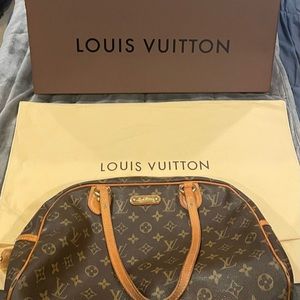 Authentic Louis Vuitton Montorguiel GM Comes with original dust bag and box